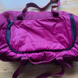 Under Armour Fuchsia Travel Duffel with Logo Print